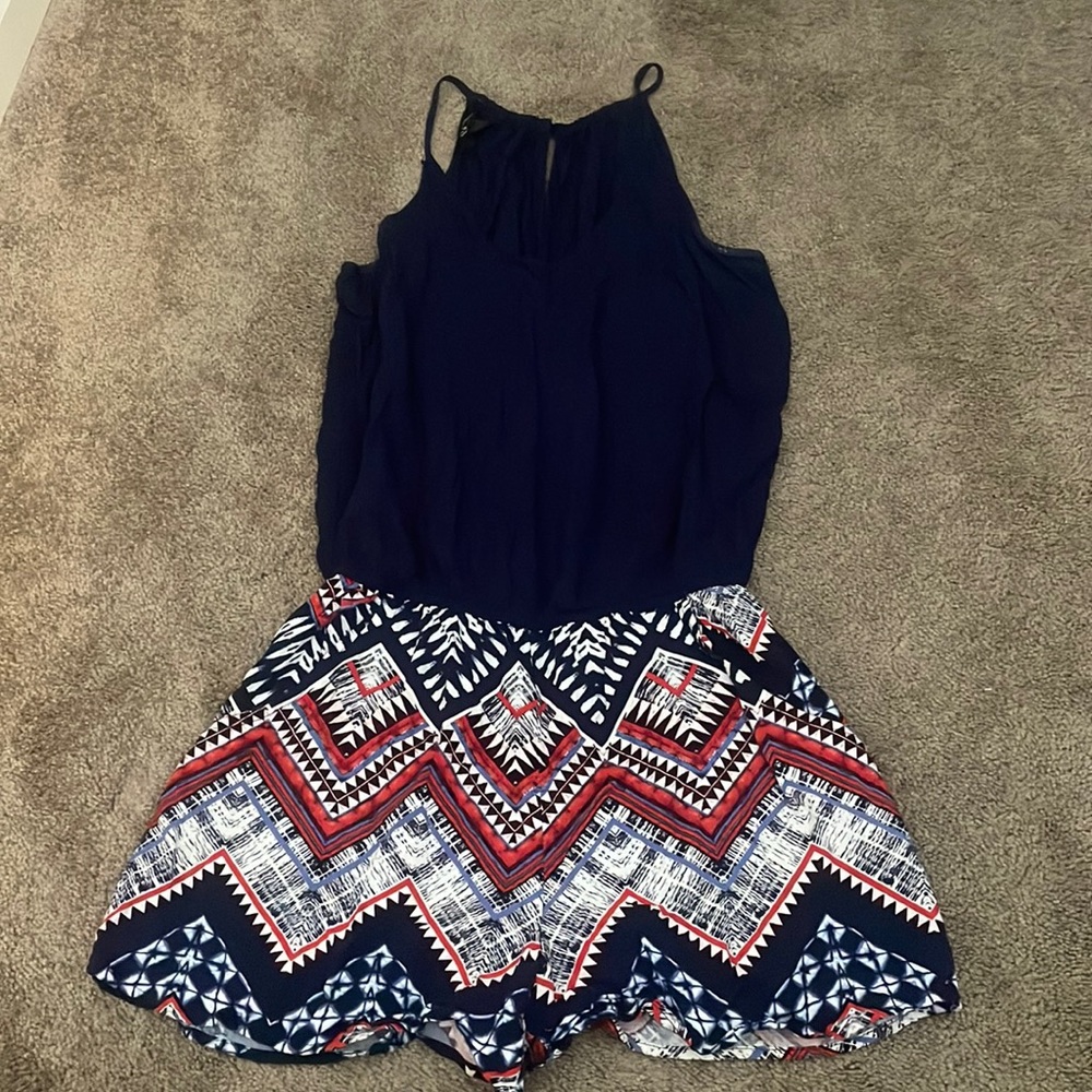 Dark blue romper with pattern on bottom half